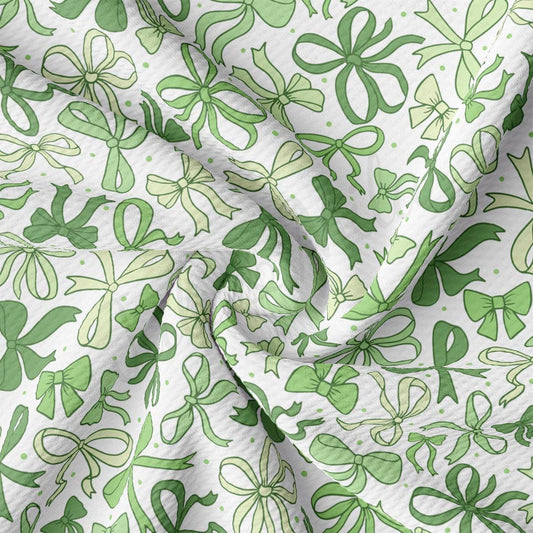 a close up of a green and white fabric