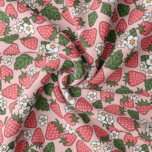 a pink fabric with strawberrys and flowers on it