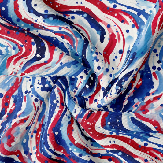 a red, white and blue fabric with red, white, and blue swirls