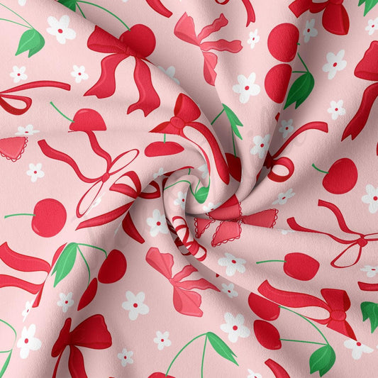 a pink background with red flowers and green leaves