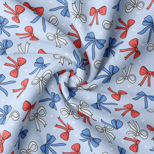 a blue background with red, white and blue bows