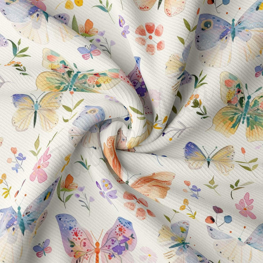 a white fabric with colorful butterflies on it