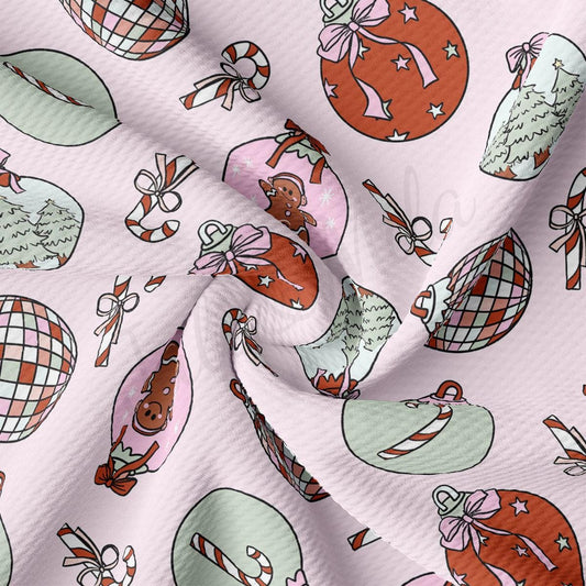 a pink background with christmas ornaments on it
