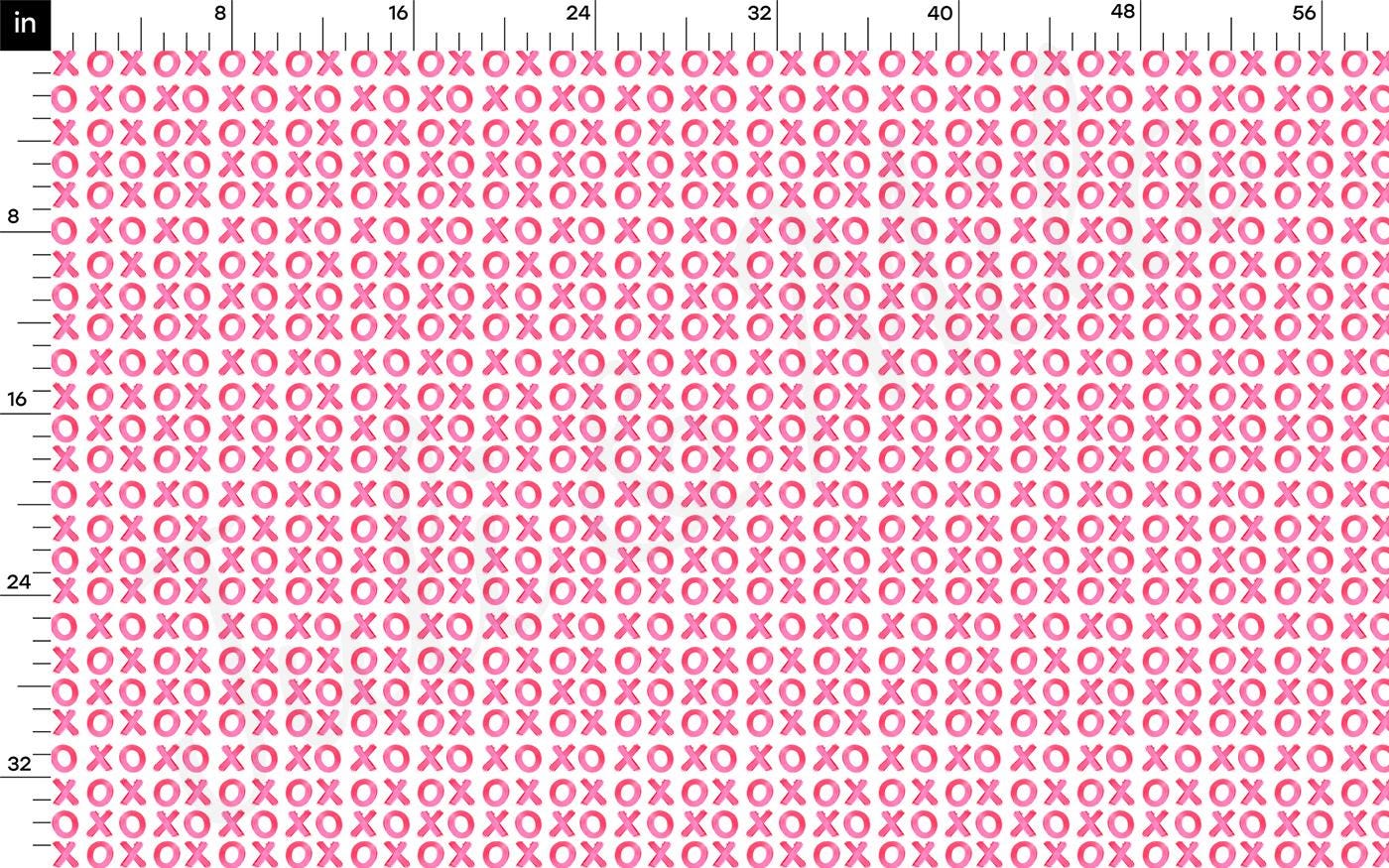 a pink and white pattern with a ruler in front of it