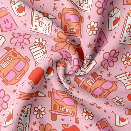 a pink background with a pattern of appliances and flowers