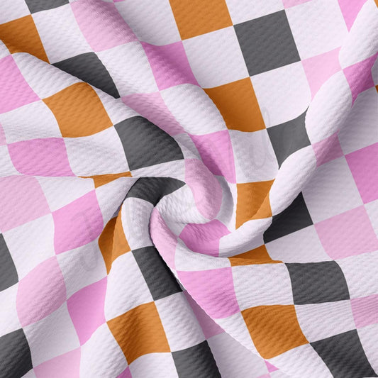 a pink, black, and white checkered fabric