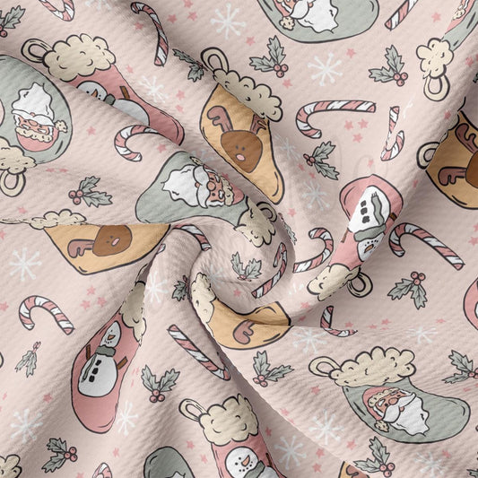 a pink background with a pattern of christmas items