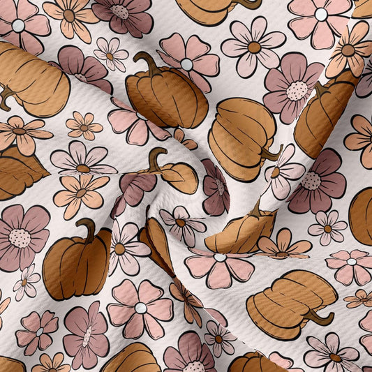 a close up of a flower and acorn print fabric