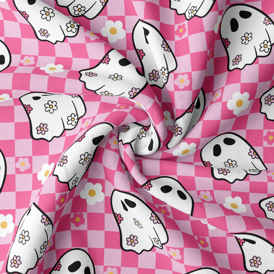 a pink and white checkered fabric with white dogs on it
