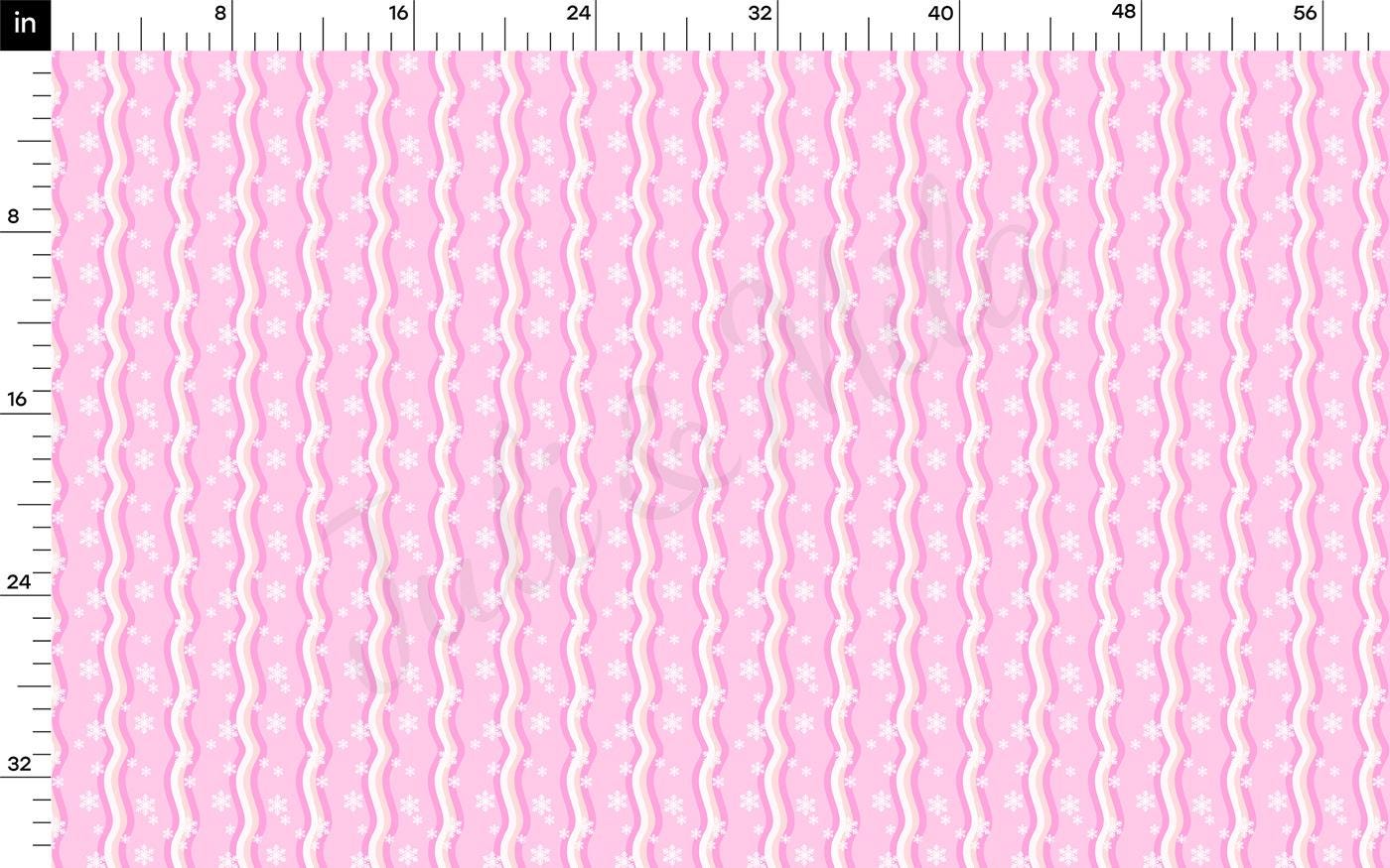 a ruler with a pink pattern on it