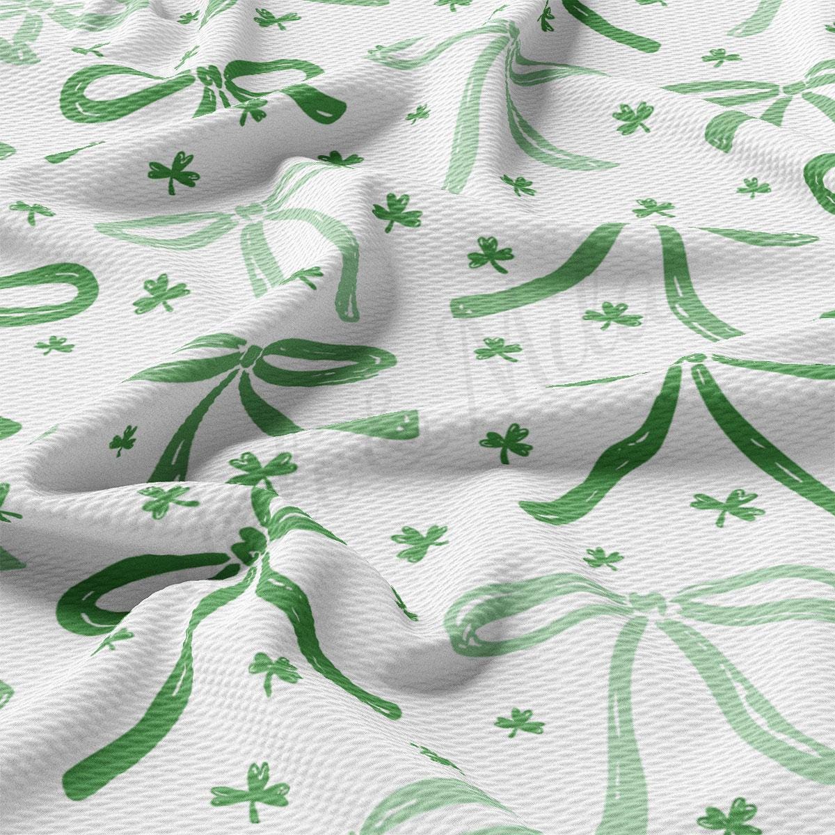 a close up of a green and white fabric