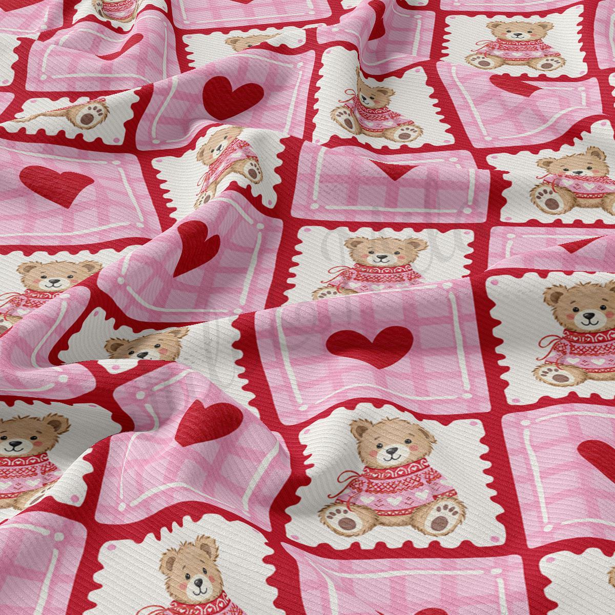 The image is a close-up of a fabric with a repeating pattern of pink and white squares, each containing a teddy bear wearing a red sweater and a heart.