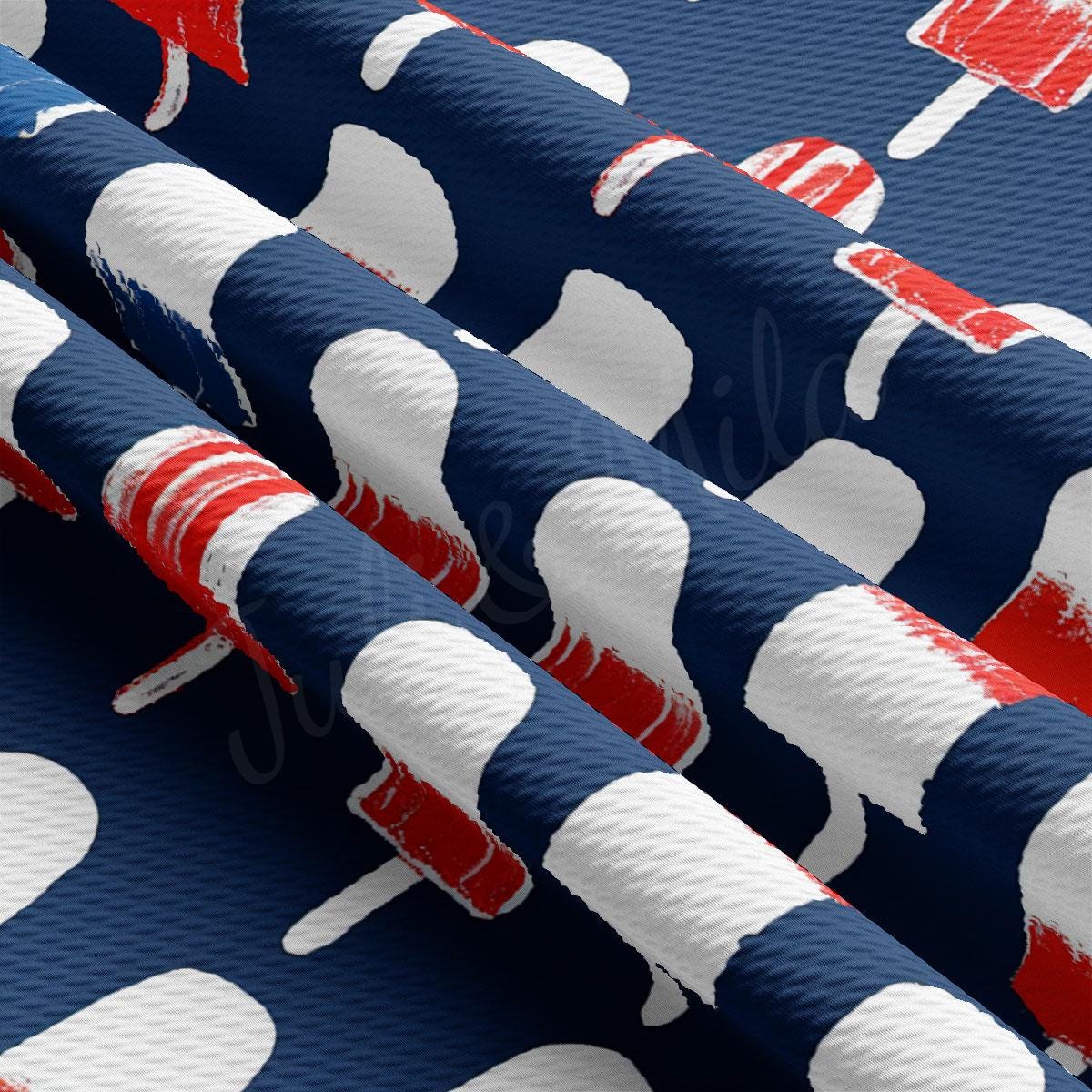 a group of red, white and blue toothbrushes on a blue background