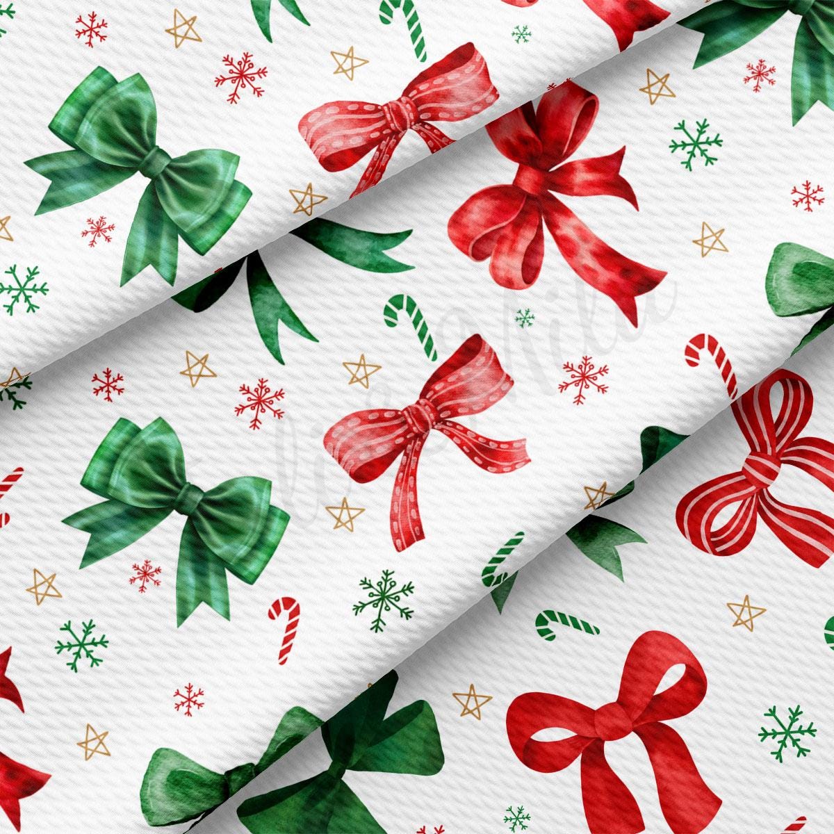 a festive pattern with green and red bows, snowflakes, stars, and candy canes.