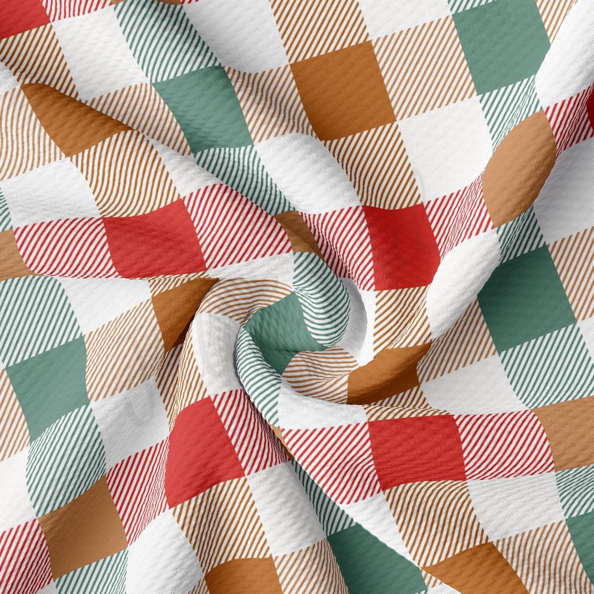 a close-up view of a fabric with a repeating pattern of red, white, and green squares, creating a checkered or plaid design.