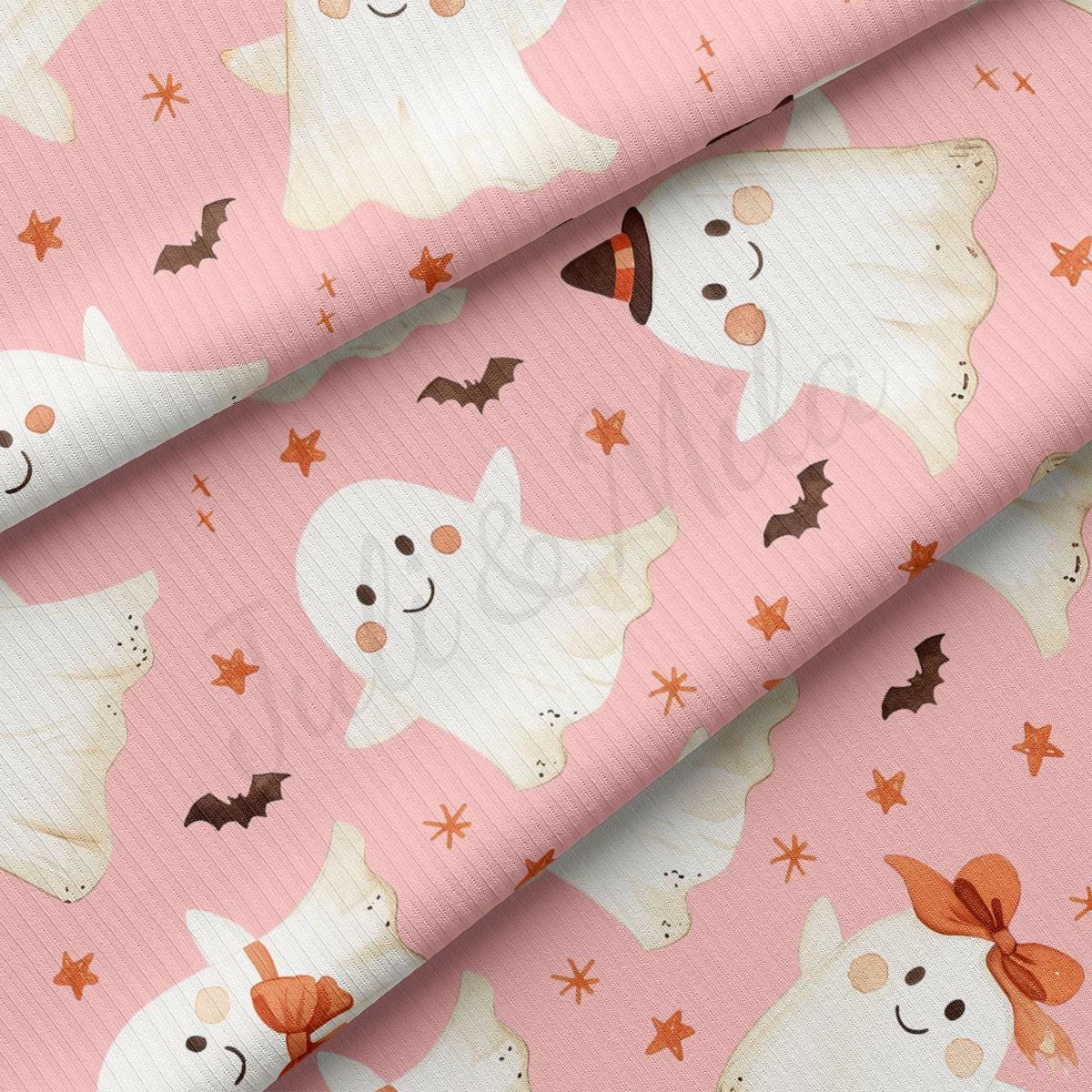 a repeating pattern of white ghost characters with orange bats and stars on a pink background.