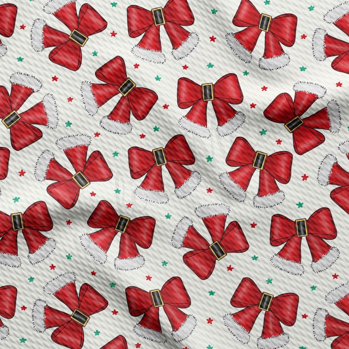 a repeating pattern of red bows with white fur trim and green stars scattered throughout the background.