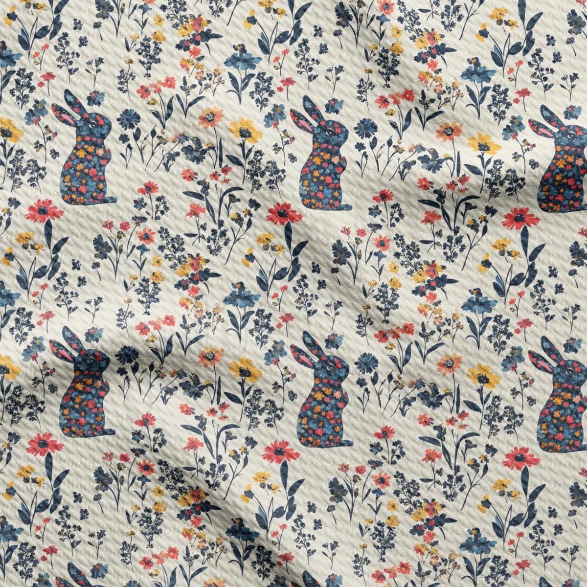 a pattern of flowers and rabbits on a white background