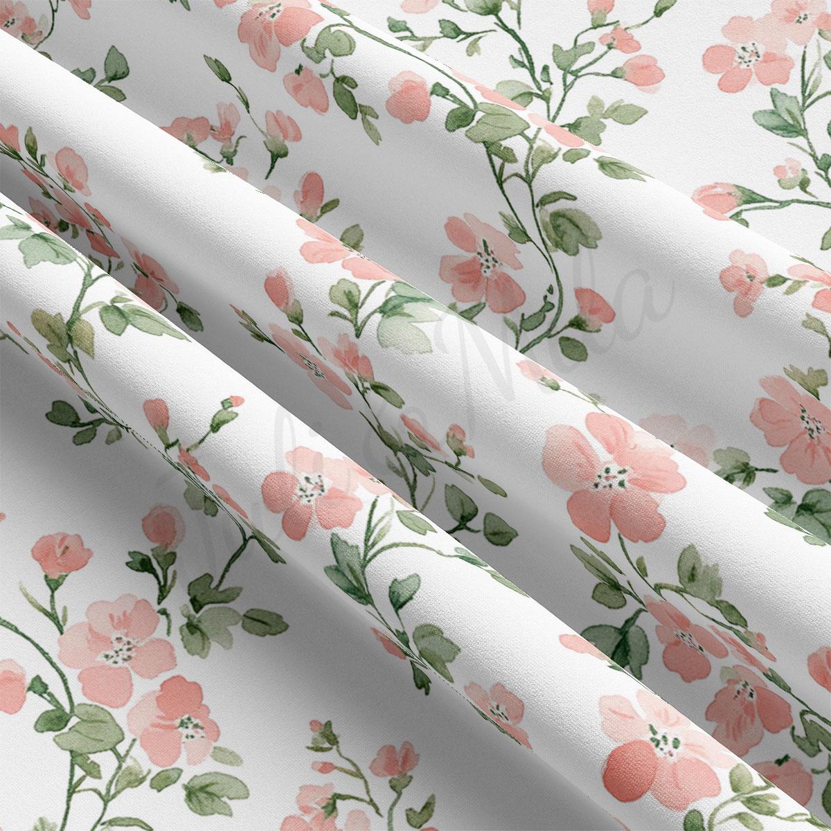 a close-up view of a fabric with a repeating floral pattern of pink flowers and green leaves. The pattern is composed of multiple rows of flowers and leaves, creating a visually appealing and intricate design.