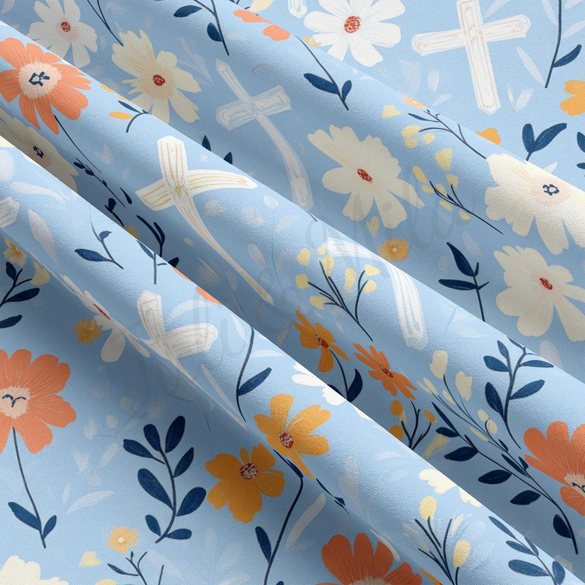 a blue background with flowers and crosses on it