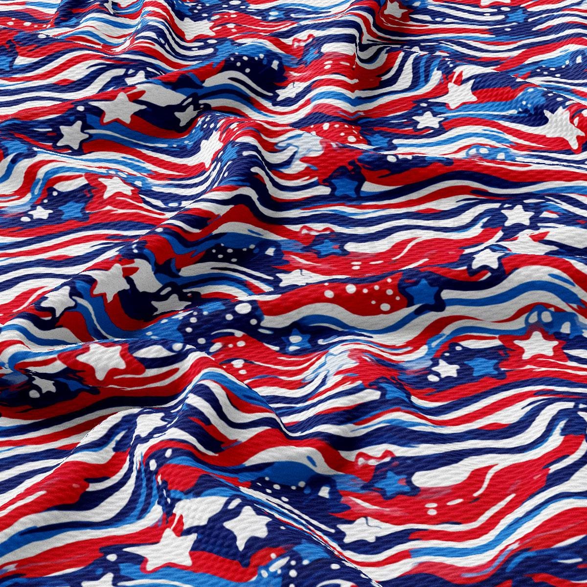 a red, white, and blue fabric with wavy lines