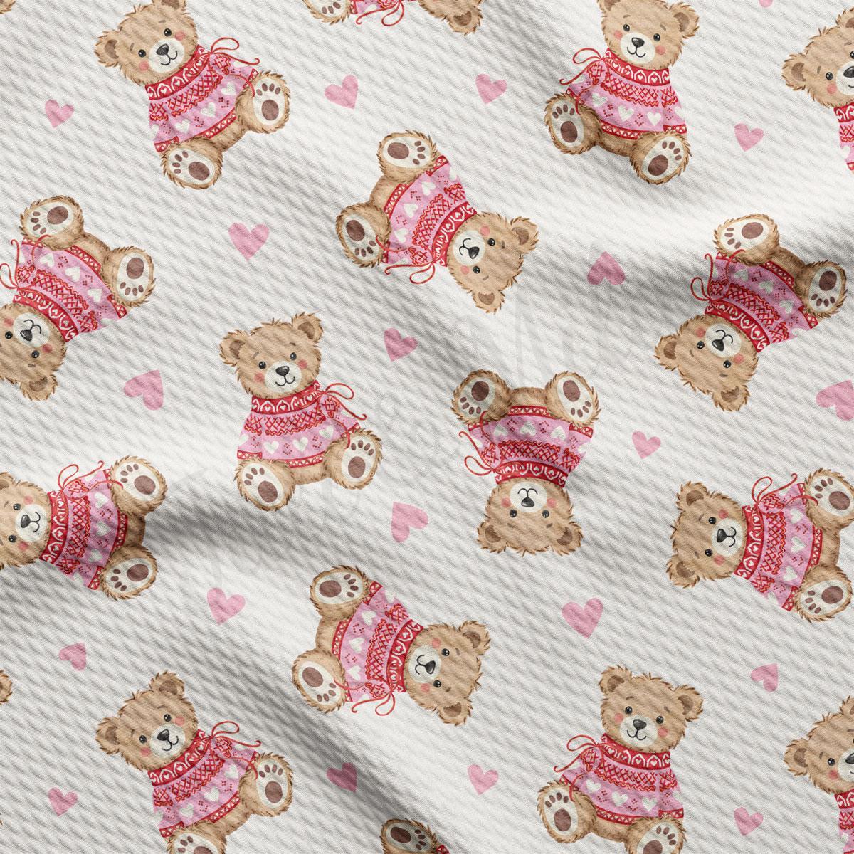 a repeating pattern of teddy bears wearing pink sweaters and hearts scattered throughout the background.