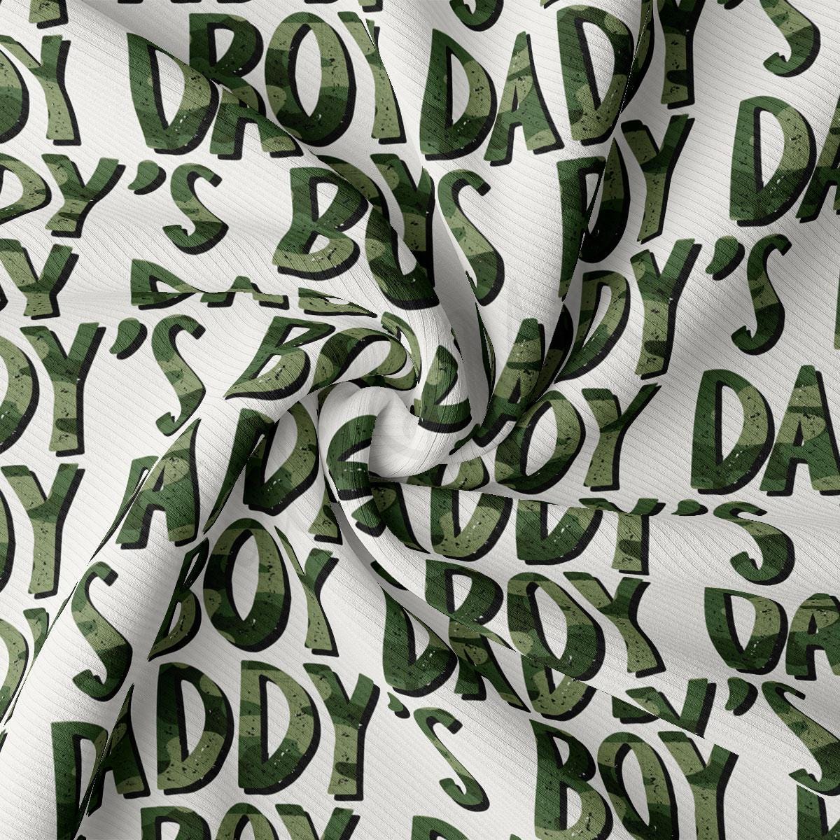 a green and white fabric with letters on it