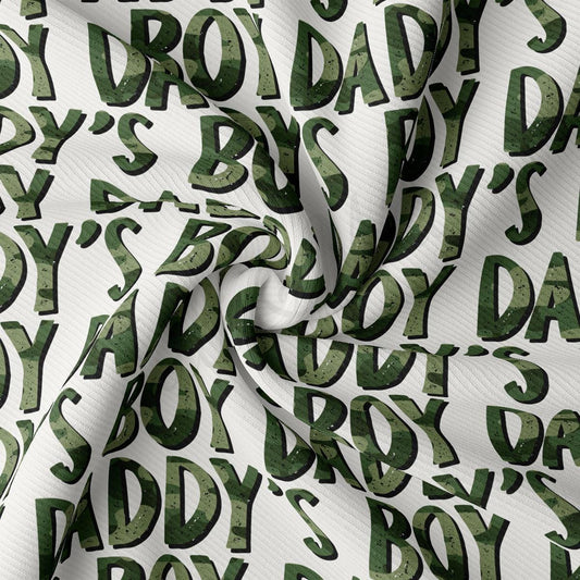 a green and white fabric with letters on it