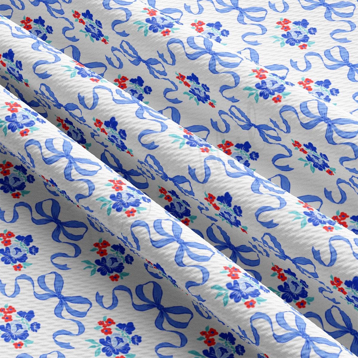 a blue and white floral print on a white background