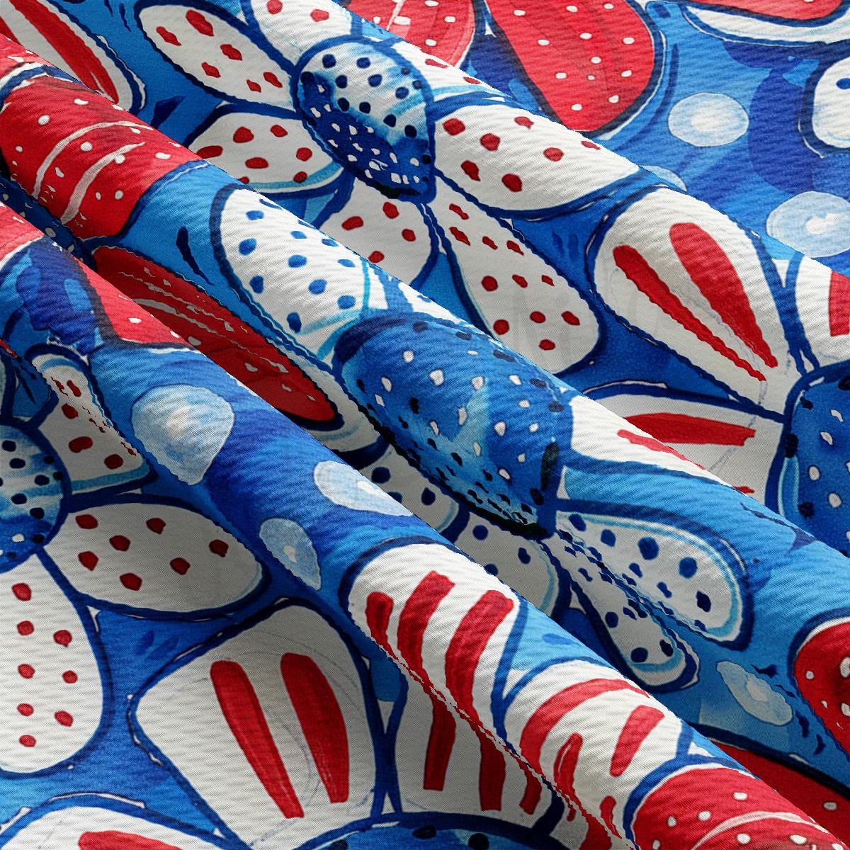 a red, white, and blue fabric with hearts on it