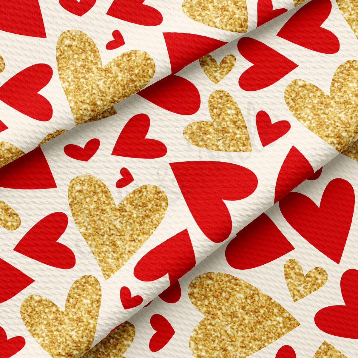 a repeating pattern of red and gold glitter hearts on a white background.