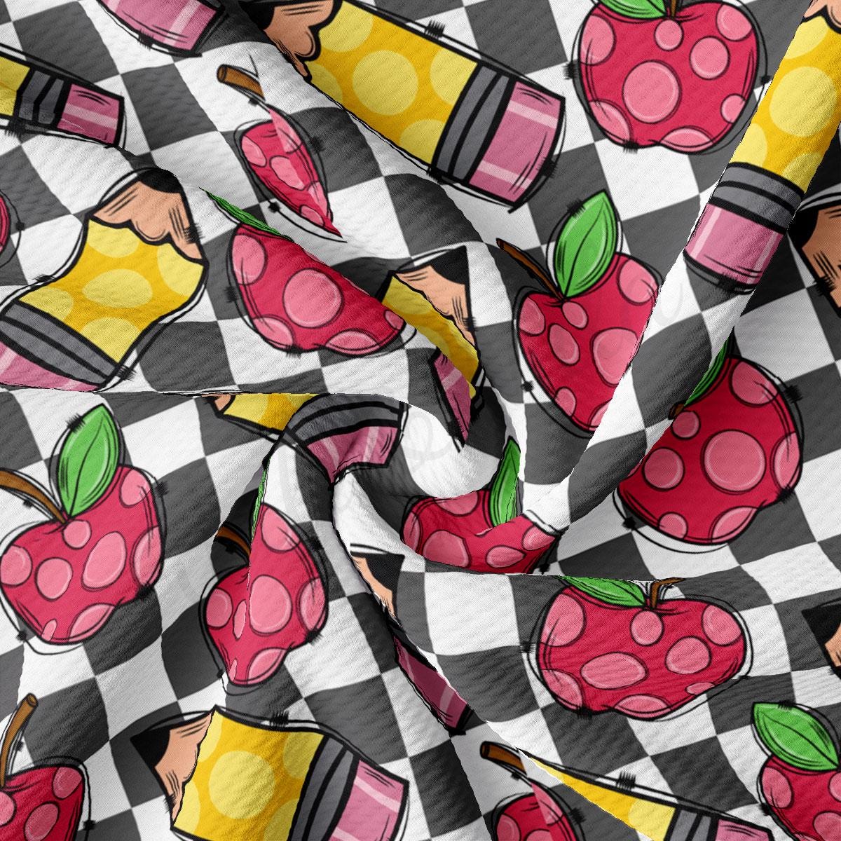 a checkered fabric with a pattern of cartoon characters