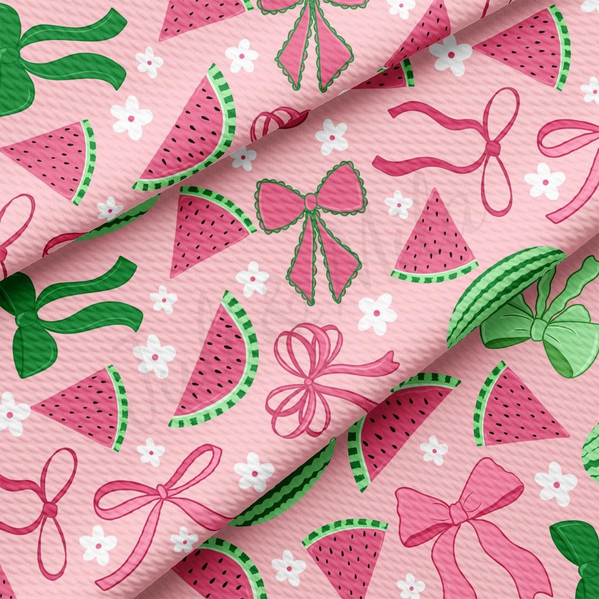 a pink background with watermelon slices and bows