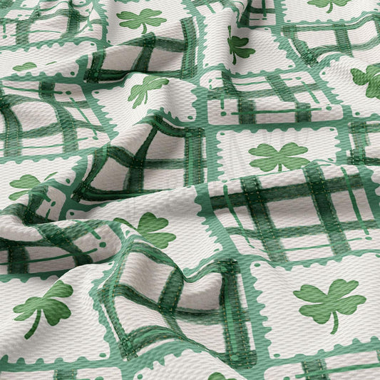 The image is a close-up view of a fabric with a repeating pattern of green shamrocks and green and white checkered designs.