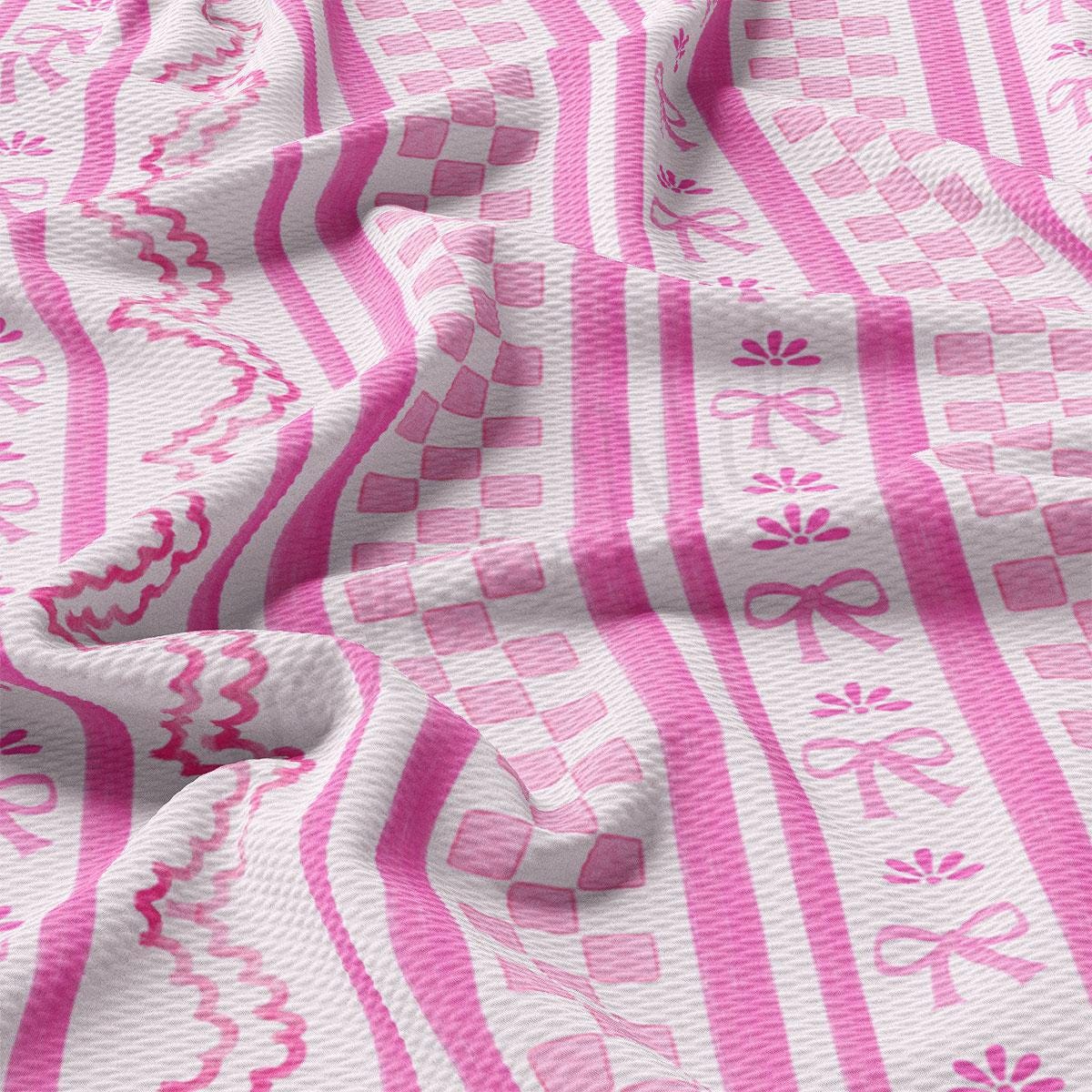 a close up of a pink and white striped fabric