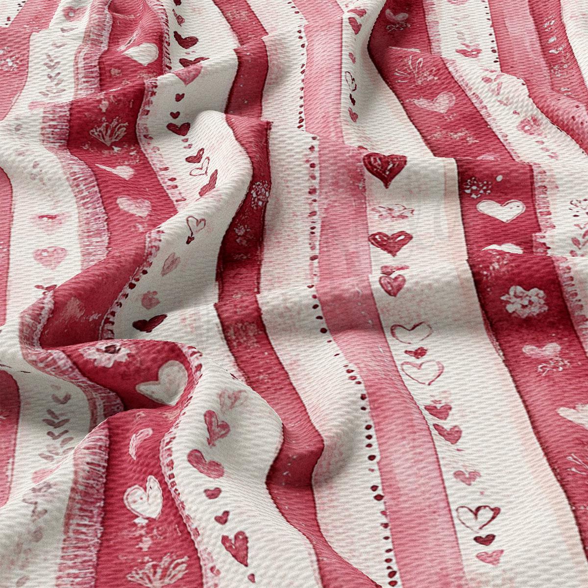 The image is a close-up view of a fabric with a repeating pattern of red and white stripes, along with various heart shapes and designs.