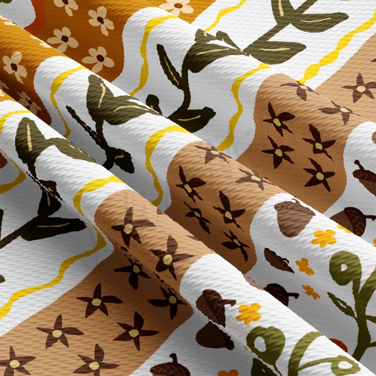 The image is a close-up view of a fabric with a repeating pattern of brown flowers and leaves, along with some yellow flowers. The fabric appears to be folded or crumpled, creating a textured and visually interesting surface.