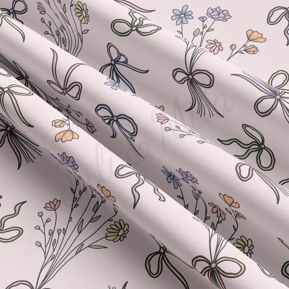 a close up of a wallpaper with flowers and bows