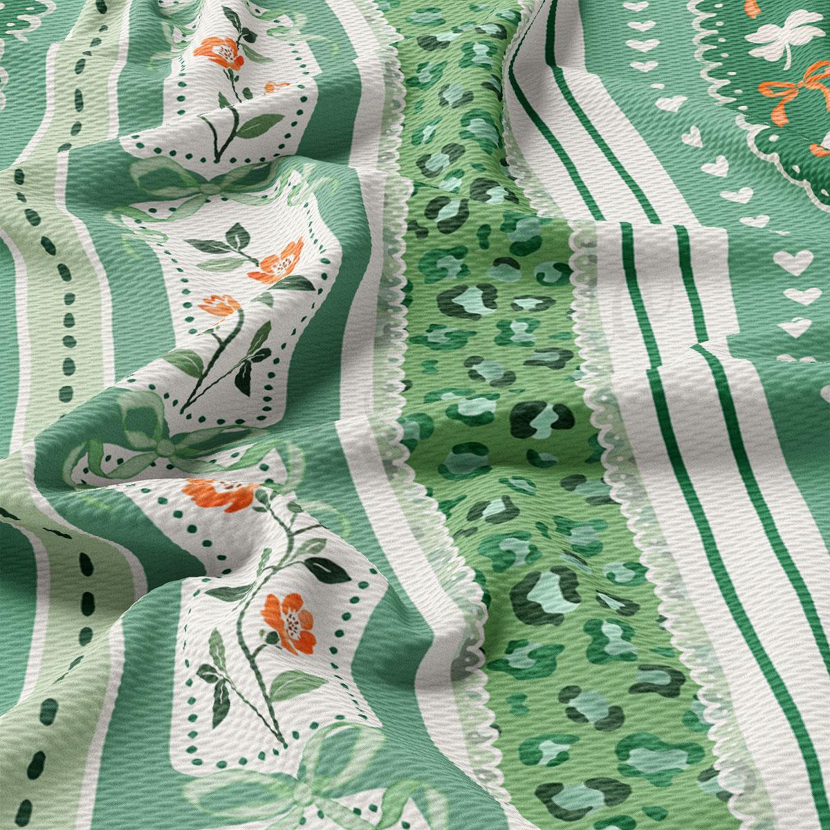 The image is a close-up view of a fabric with a vibrant green and white color scheme, featuring floral and leopard print patterns.