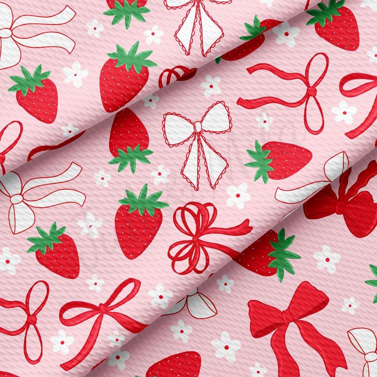 a pink background with red and white bows and strawberries