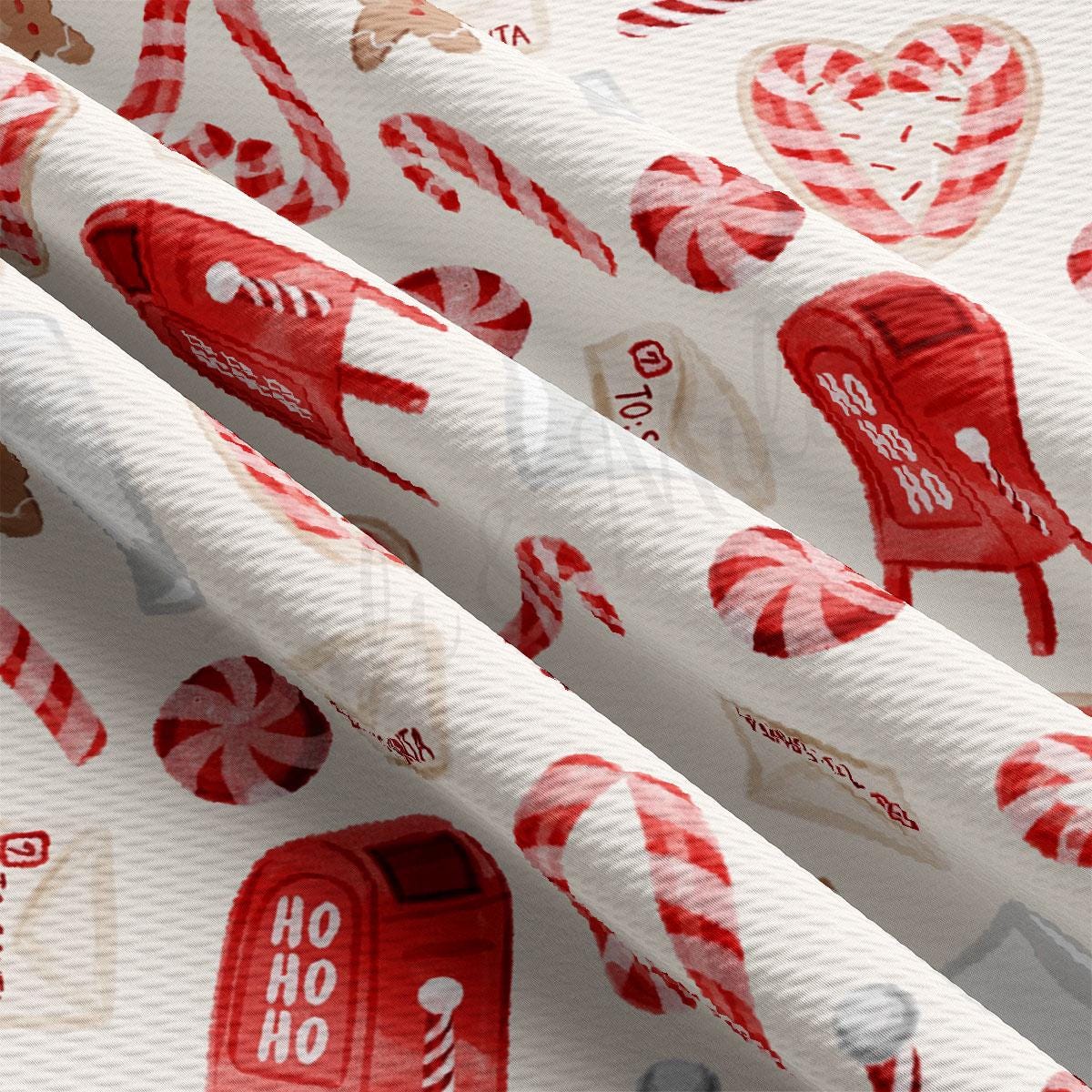 a close up of a wrapping paper with candy canes on it