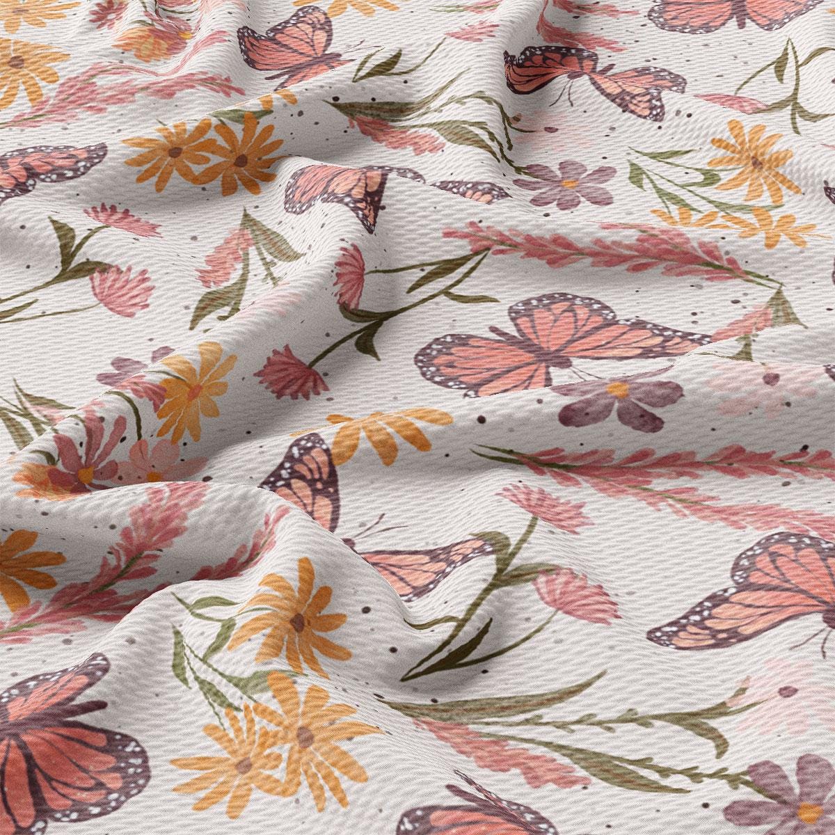 a close up of a butterfly print fabric