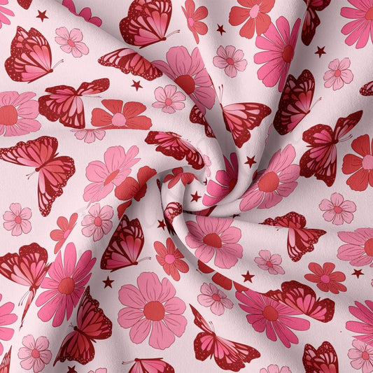 a pink and red butterfly print fabric
