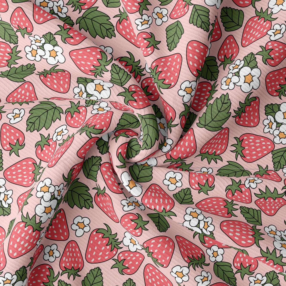 a pink fabric with strawberrys and flowers on it
