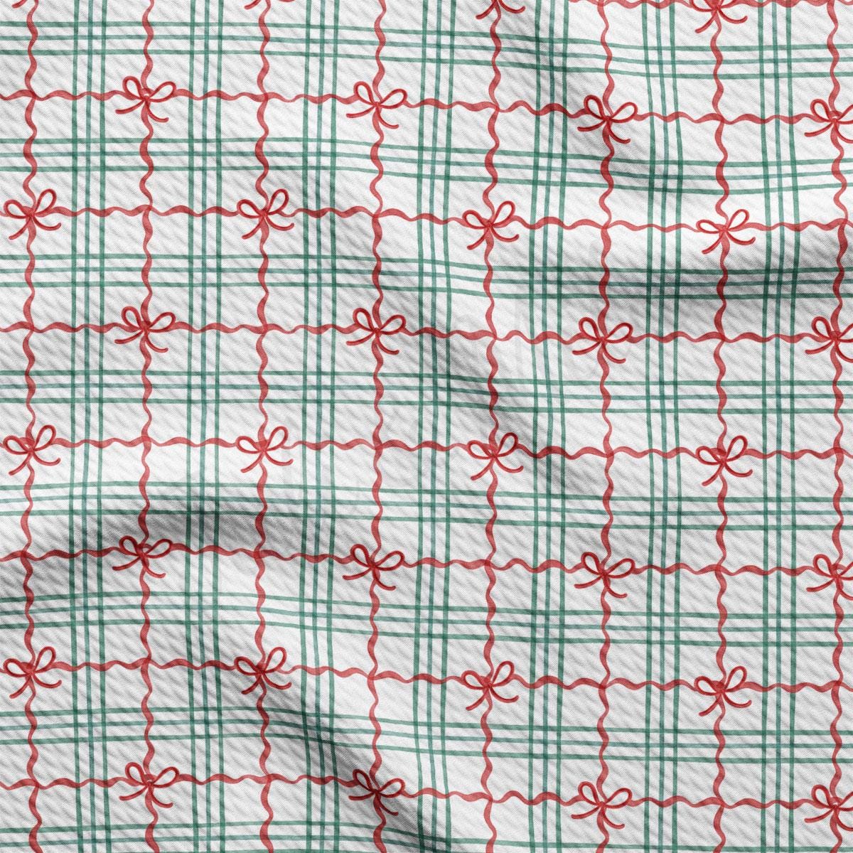 a repeating pattern of red and green checkered lines with red bows on a white background.