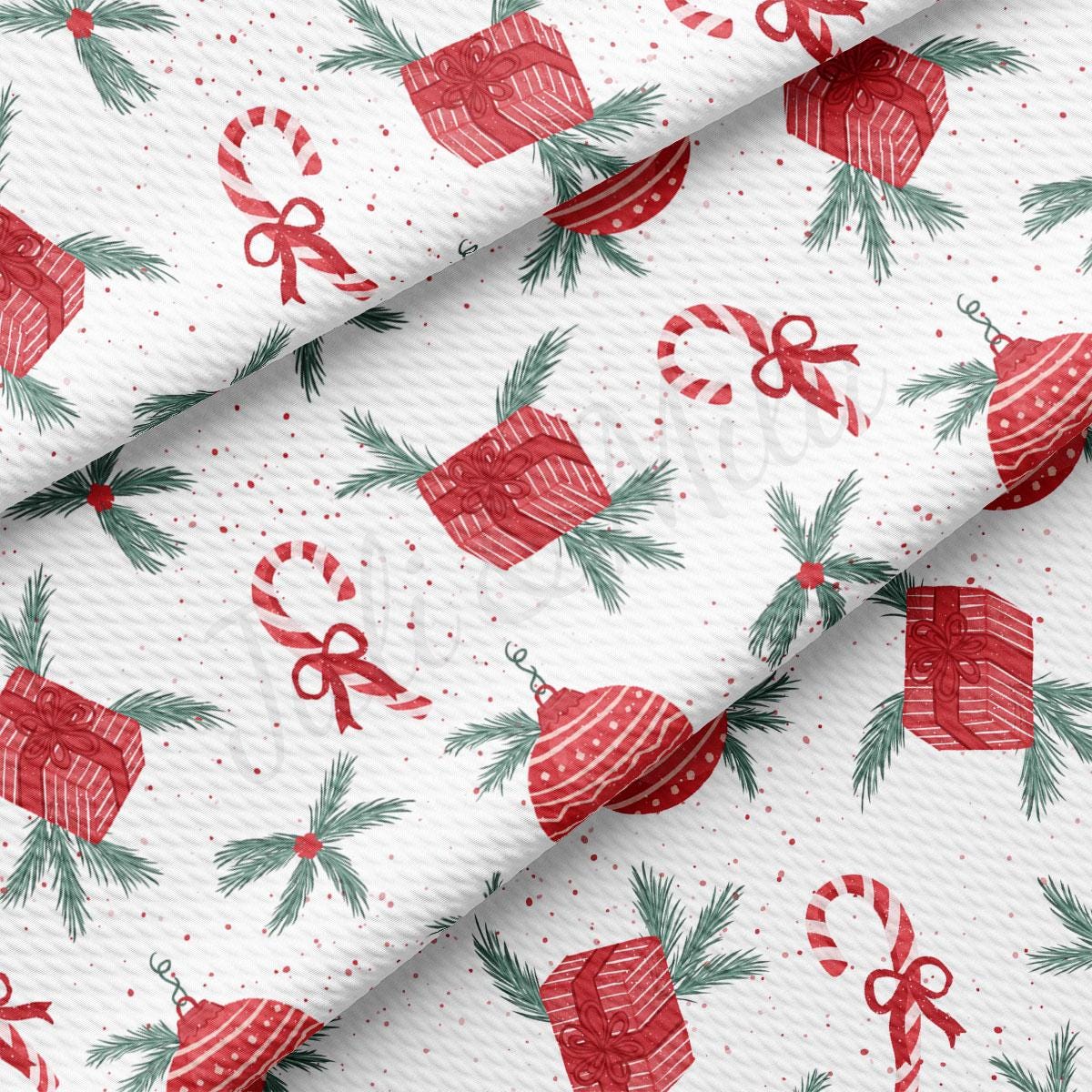 a white background with red and green christmas decorations