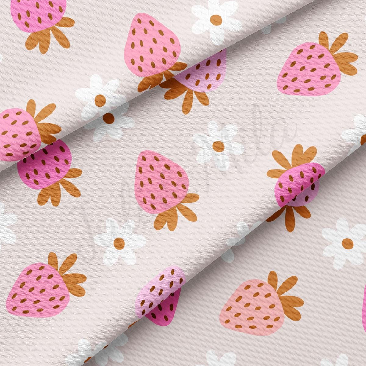 a pink and brown strawberry pattern on a white background