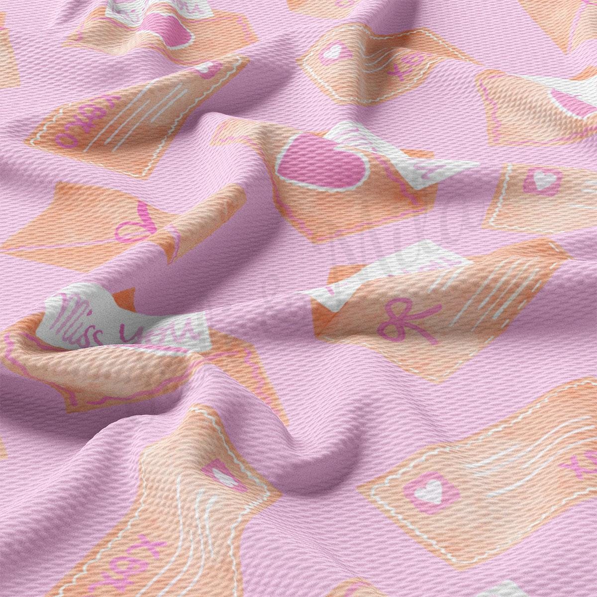 a close up of a pink and orange fabric