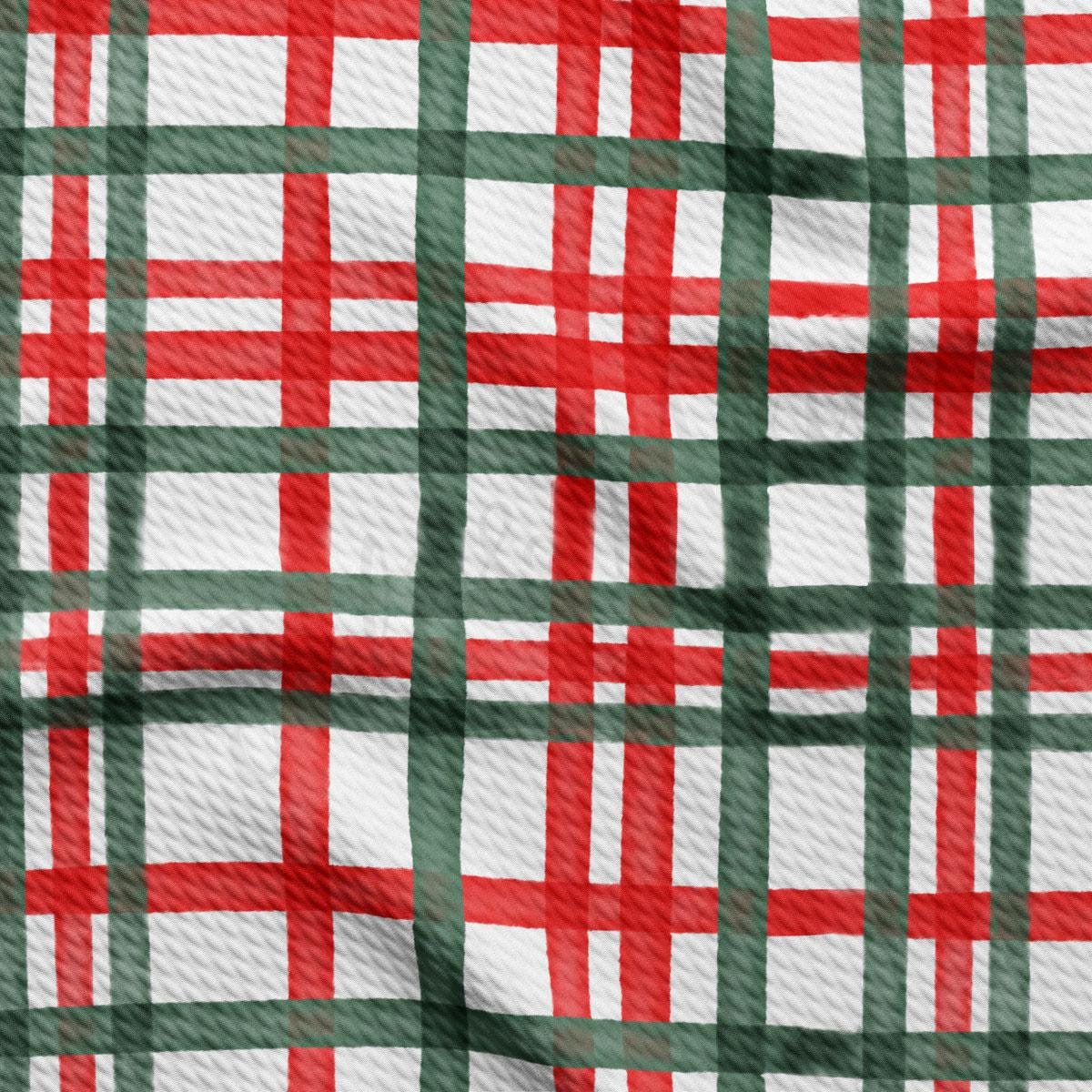 a close-up view of a fabric with a repeating pattern of red and green stripes, resembling a plaid or checkered design.