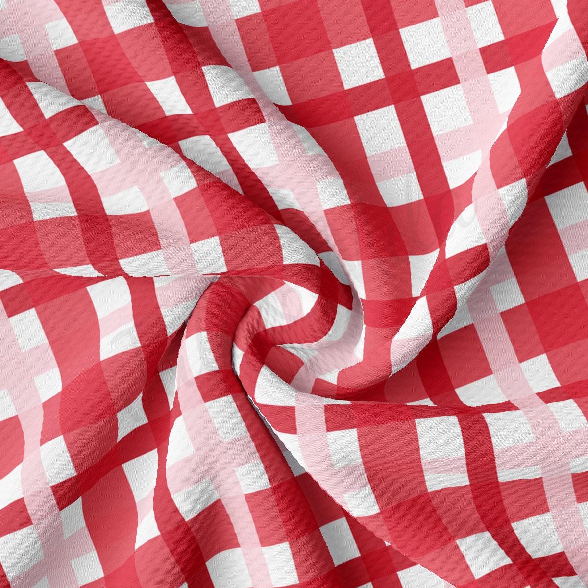 a red and white checkered fabric is shown